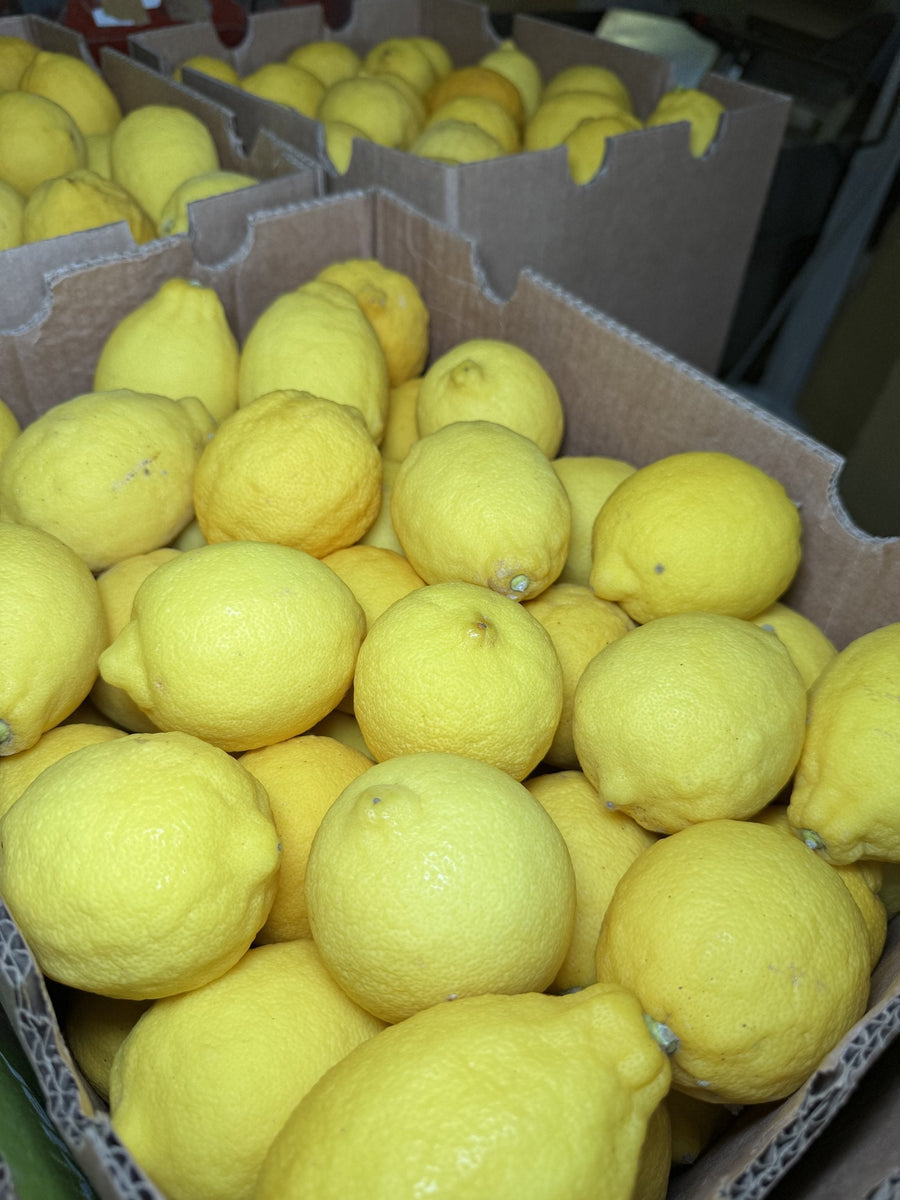 Crate of fresh lemons