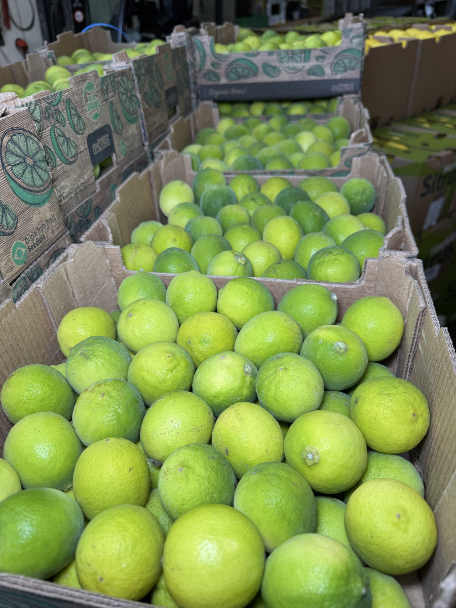 Crates of fresh limes